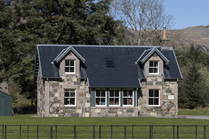 New one and a half storey stone cottage with slate roof. Isle of Mull, Scotland. Built with traditional materials to sit with existing buildings.