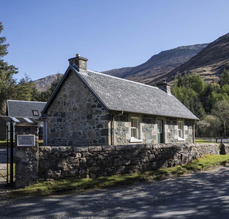 New stone cottage in a traditional style with slate roof. A project by Harry Taylor & Co