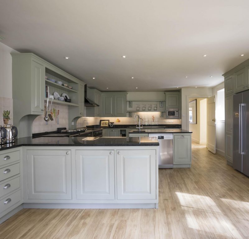 Large country kitchen in a Scottish island country house. Heritage colours and fine cabinetry.