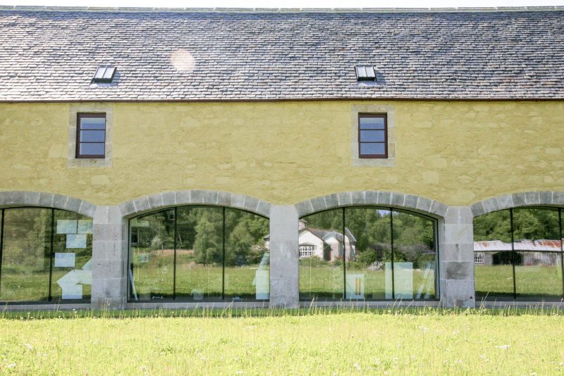 Stables on the Altyre estate after renovation for use by the Glasgow school of Art. Yellow render has been replaced and glazing inserted